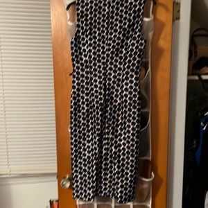 Back view of Calvin Klein neoprene black/white sheath dress.  Invisible back zip